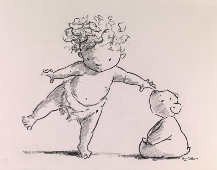 Baby balancing on teddy's nose